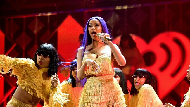 Cardi B said, “It screamed racist to me, super racists,” after confronting a snapper.