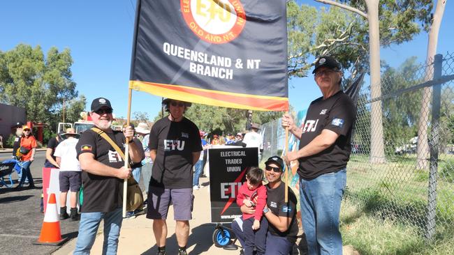 Members of the Electrical Trades Union wait for the muster to kick off.