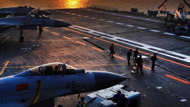 Chinese F-15 “Flying Shark” fighters on the deck of the aircraft carrier Liaoning. Picture: PLA.