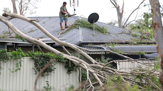 Discovery Drive at Helensvale after the area was smashed by a ferocious storm on Christmas night. Picture: Adam Head