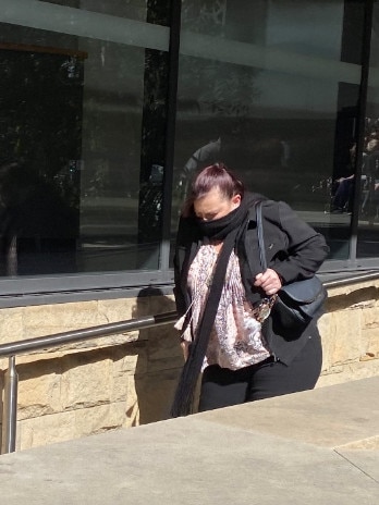 Debra Leeanne Costelloe from Beresfield leaving court after she was “duped” into a romance scam. Picture Amy Ziniak