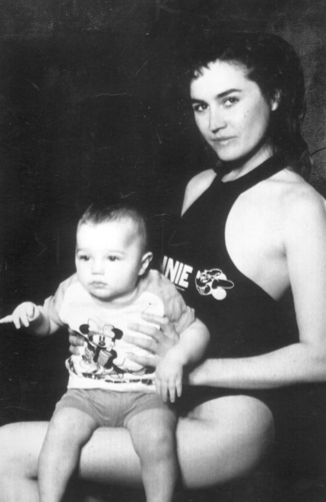 Lory Del Santo, ex-girlfriend of Eric Clapton, holds their son Conor in 1988.