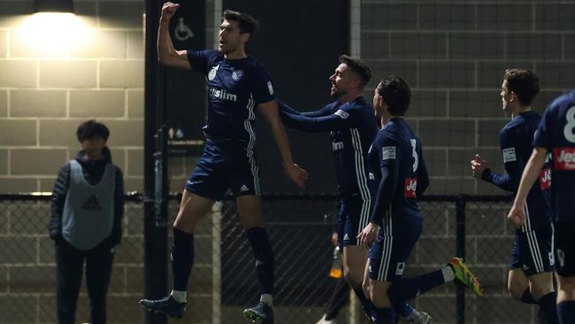 Jordon Hall celebrates scoring a goal for Oakleigh Cannons.