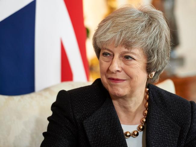 Britain's Prime Minister Theresa May talks with Poland's Prime Minister Mateusz Morawiecki inside 10 Downing Street in central London on December 20, 2018, during their bilateral meeting ahead of the UK-Poland Inter-Governmental Consultations. (Photo by Niklas HALLE'N / POOL / AFP)