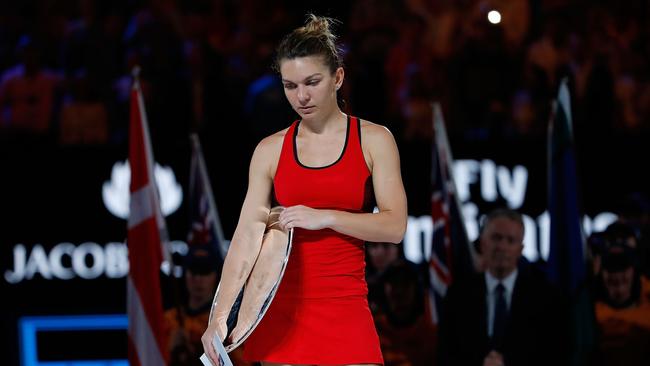 A dejected Simona Halep of Romania looks on after losing the women's singles final to Caroline Wozniacki.