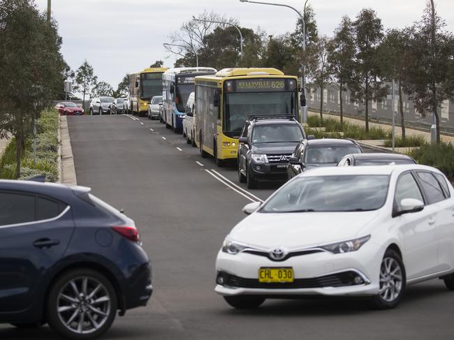 Cars line up for the COVID-19 testing clinic at Castle Hill Showground. Picture: Dylan Robinson