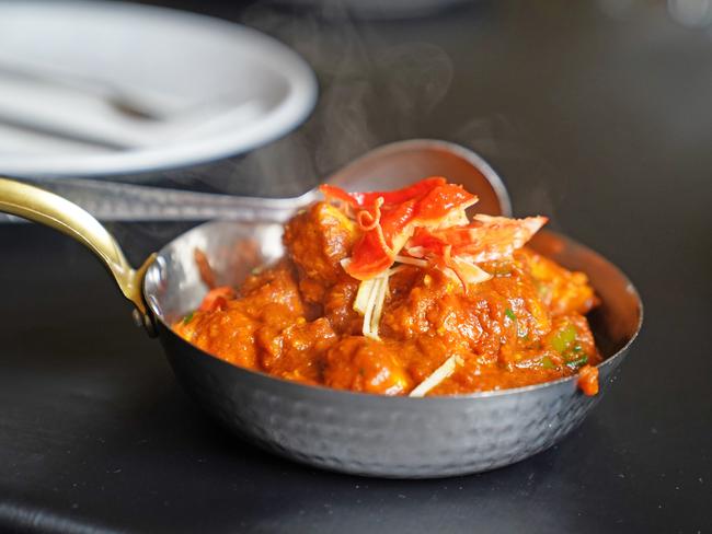 The super spicy Platinum Jubilee Chicken Curry – complete with Carolina Reaper red hot chillies – created by chef, and owner of the Ashiana Indian restaurant in Manly, Rajesh Kalra, to celebrate Queen Elizabeth II's 70 years on the throne. Picture: Max Agency