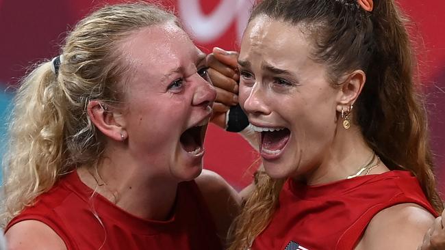 USA's Jordyn Poulter and Kelsey Robinson celebrate their victory in the women's gold medal volleyball match. Picture: AFP