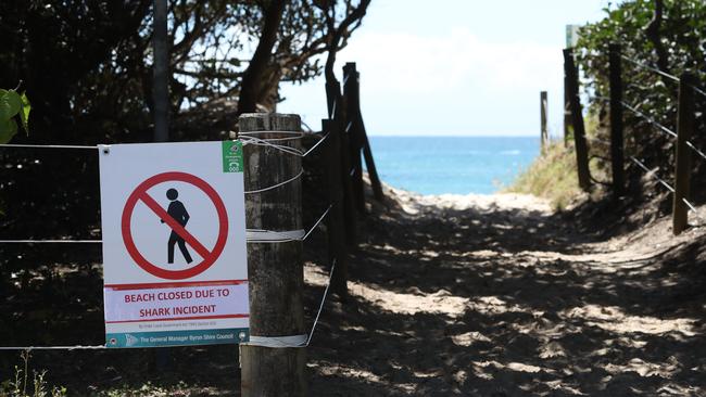 A man was injured in a shark attack at Suffolk Park beach, just south of Byron Bay. Warning sign to be users of the attack. Picture by Scott Fletcher