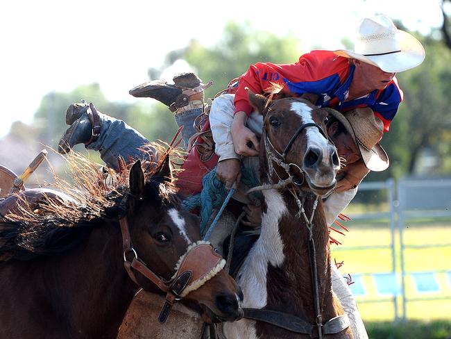 The pick up man at the Saddle Bronc Riding School in Attunga had to work overtime looking after the young cowboys. Picture Peter Lorimer