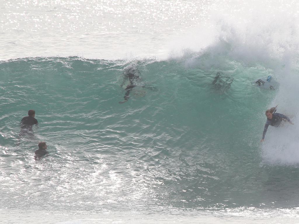 Surfers pictured enjoying good swell and near perfect waves at Snapper Rocks. Picture: Mike Batterham