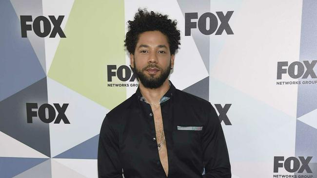 FILE - In this May 14, 2018 file photo, Jussie Smollett, a cast member in the TV series "Empire," attends the Fox Networks Group 2018 programming presentation afterparty in New York. A police official says "Empire" actor is now considered a suspect "for filing a false police report" and that detectives are presenting the case against him to a grand jury. Smollett told police he was attacked by two masked men while walking home from a Subway sandwich shop at around 2 a.m. on Jan. 29. He says they beat him, hurled racist and homophobic insults at him and looped a rope around his neck before fleeing. (Photo by Evan Agostini/Invision/AP, File)