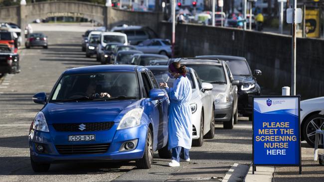 A long line of cars stretch Campbell Parade as COVID testing takes place at Bondi Beach. Picture: Dylan Robinson