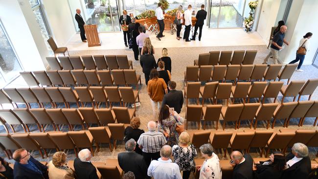 Friends of the family pay tribute at the funeral of Dick and Clayton Lang who died as fire tore through Flinders Chase. Picture: AAP Image/David Mariuz