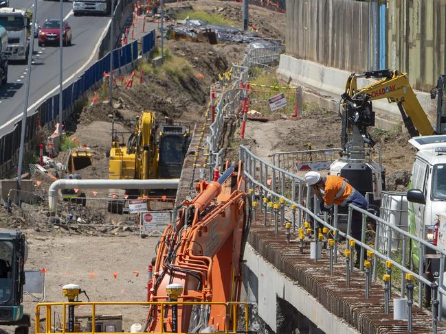 A mound of soil- covered in black tarp behind the barricades running along the Westgate Freeway, Williamstown Road on- ramp heading outbound.Picture Jay Town