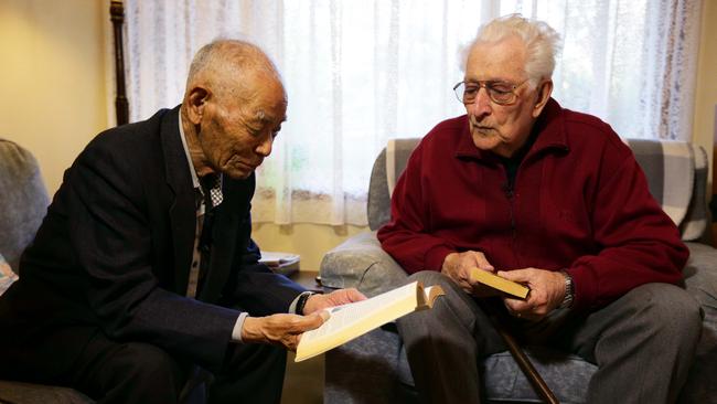 Mr Murakami with former Cowra prison guard Ron Ferguson at his home.