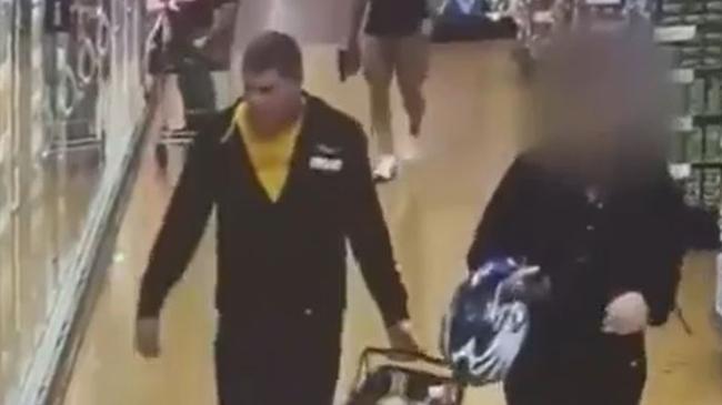 CCTV footage shows former Comanchero bikie Danny Rapley and a woman inside a supermarket. Picture: 9News