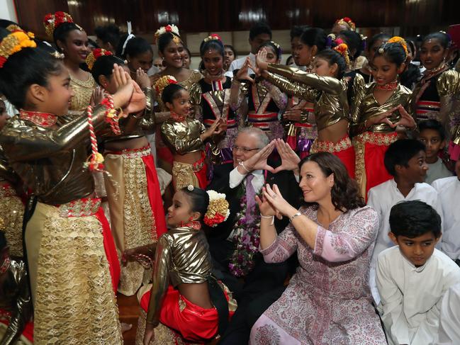 Prime Minister Scott Morrison and his wife Jenny during a visit to the Berwick Temple in Melbourne. They participated in a Buddhist ceremony and the PM announced funding for work on a new building for the Sinhala Language School. Picture Gary Ramage