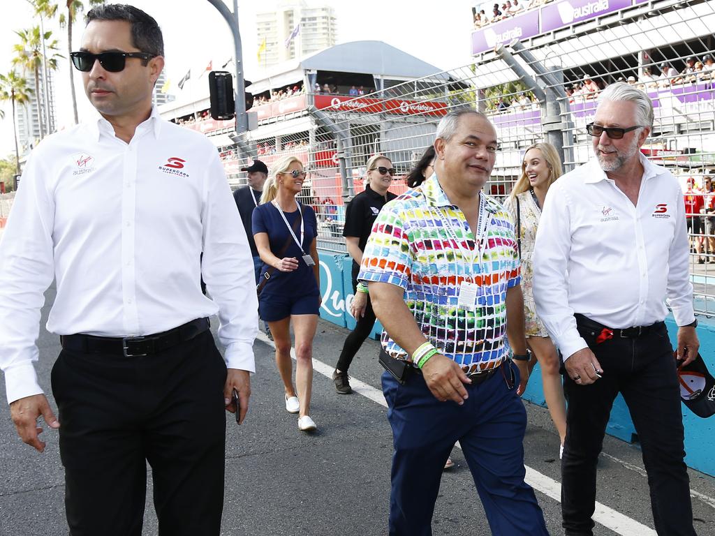 V8 Supercars CEO Sean Seamer, Gold Coast mayor Tom Tate and Supercars COO Shane Howard on the starting grid at the Vodafone Gold Coast 600 (GC600), in Surfers Paradise, on Sunday. Picture: Tertius Pickard