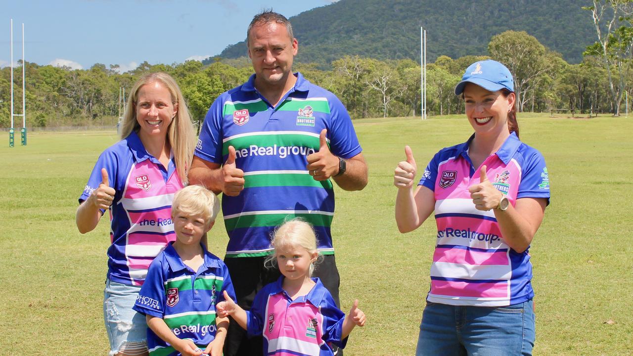 Member for Keppel Brittany Lauga discusses the announcement with Bree and Joel Ryan with their two children.