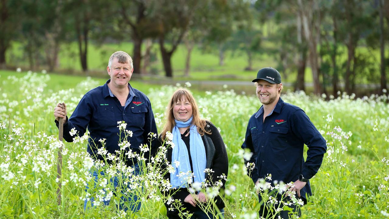 Farmer and inventor Niels Olsen with his wife, Marja, and their son, Jamie, on their Hallora cattle farm in South Gippsland. Picture: Andy Rogers