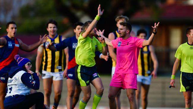 The moment an umpire awarded a 50m penalty which cost Coburg victory against Sandringham. Picture: Dave Savell.