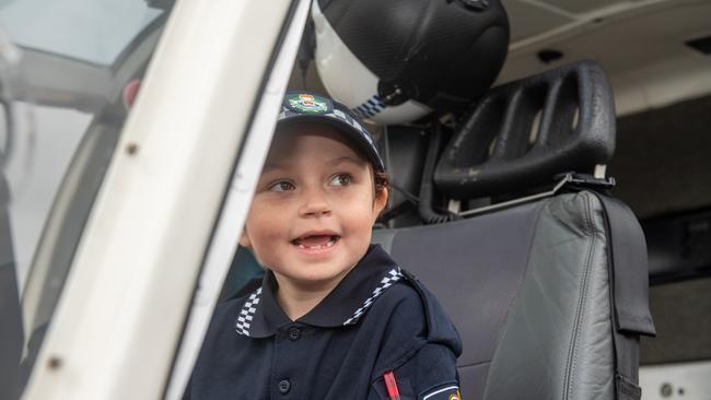 Savannah Burns in the police helicopter at the Gatton Showgrounds, thanks to the Make A Wish Foundation and the Gatton Police station. PHOTO: Ali Kuchel