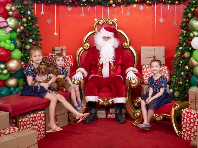 Piper, Skye and Adrian with Santa: Moranbah Fair 2023 - Mackay. Sent in by their mum, Mady Parsons.