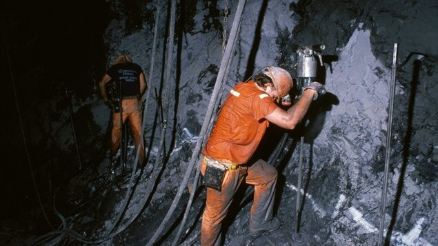 Mount Isa Mines. Workers sinking the P49 shaft, 1971. Strip and line.