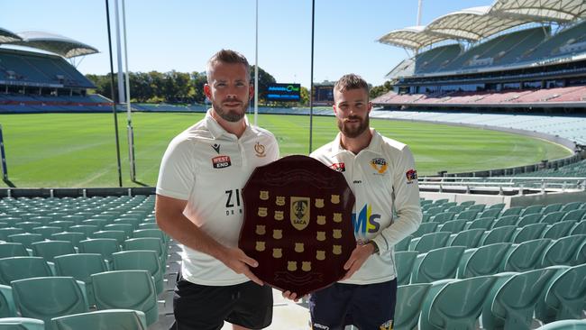 Tea Tree Gully captain Joe Gatting (left) with West Torrens’ Daniel Drew before last season’s grand final. Picture: SACA