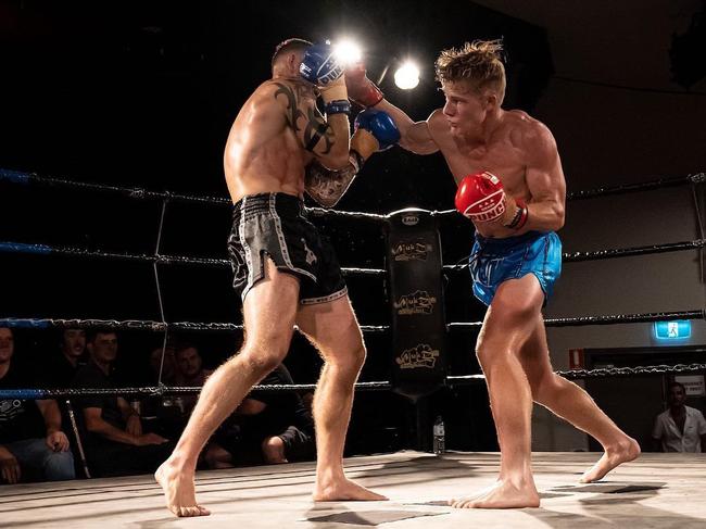 DF Gym fighter Ryan McDonald (black shorts) and Rippers Muay Thai's Oliver Hanson (Blue shorts) trade blows during the 4-Man King of the North battle. Picture: Supplied