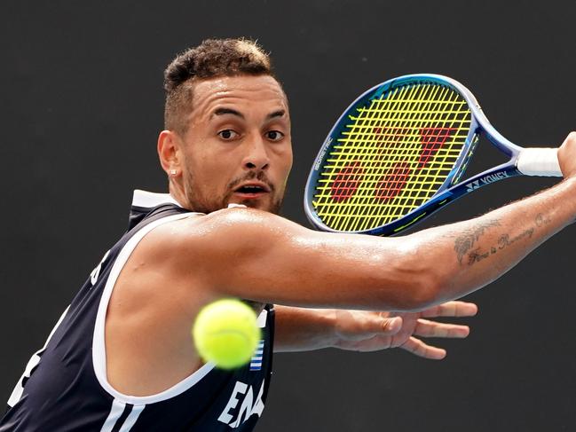 Nick Kyrgios of Australia plays a shot during an Australian Open practice session at Melbourne Park in Melbourne, Saturday, January 18, 2020. (AAP Image/Scott Barbour) NO ARCHIVING