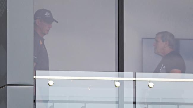 Wayne Bennett forced to watch from his office. (Annette Dew)