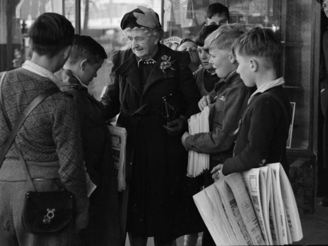 Edith Onians with some of the boys of her Melbourne Newsboys Club in 1950. Must credit State Library of NSW.