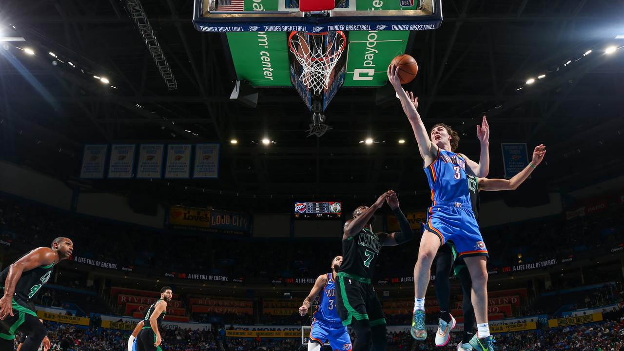 Josh Giddey #3 of the Oklahoma City Thunder drives to the basket during the game against the Boston Celtics (Photo by Zach Beeker/NBAE via Getty Images)