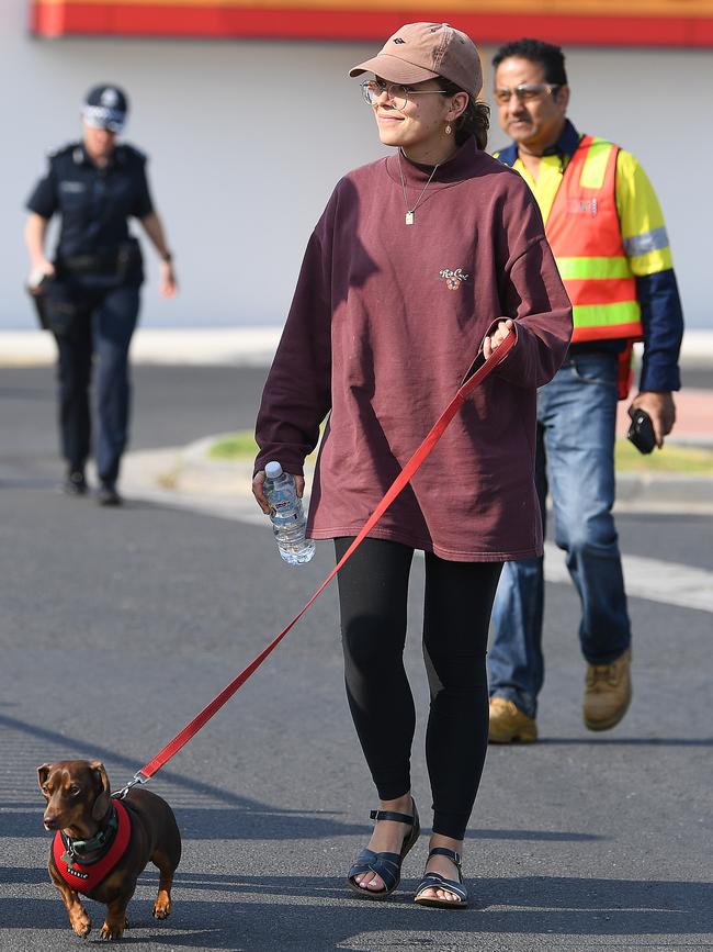 Mallacoota bushfires evacuees and a dachshund arrive at the Somerville Recreation Centre. Picture: Julian Smith