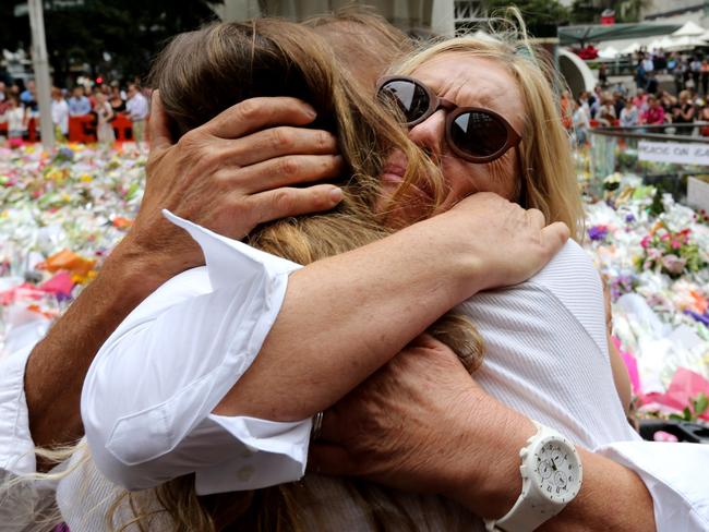 Tori Johnson's mother Rosie at the floral memorial following his death. Picture: Adam Taylor