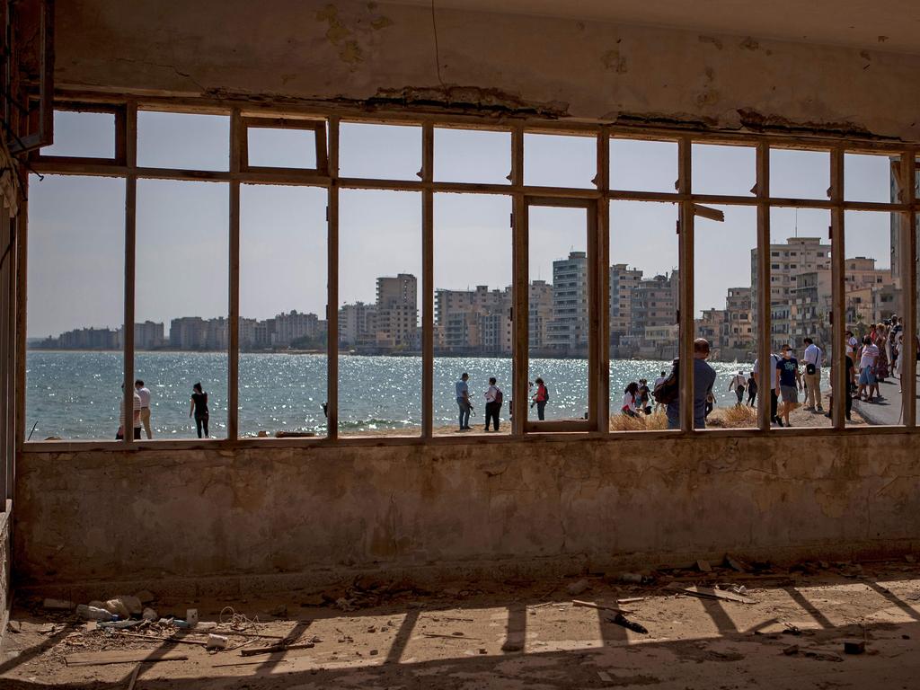 Visitors came flooding back to the abandoned resort city. Picture: Birol Bebek / AFP