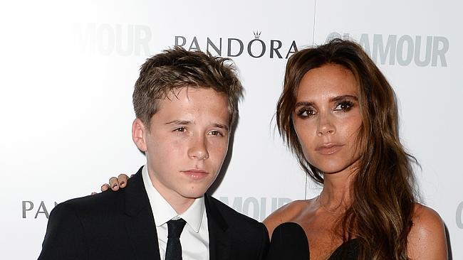 Puppy love ... Brooklyn Beckham, with his mum Victoria, is said to have his first girlfriend.