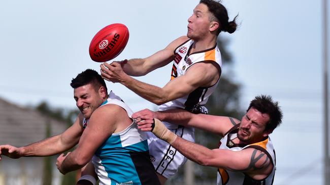 Liam Middleton flies high for a mark for Craigieburn. Picture: Jamie Morey