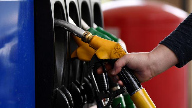 Petrol prices are at a 15-year low in Brisbane amid a ‘perfect’ storm of price plummeting factors. (Photo by FRANCK FIFE / AFP)