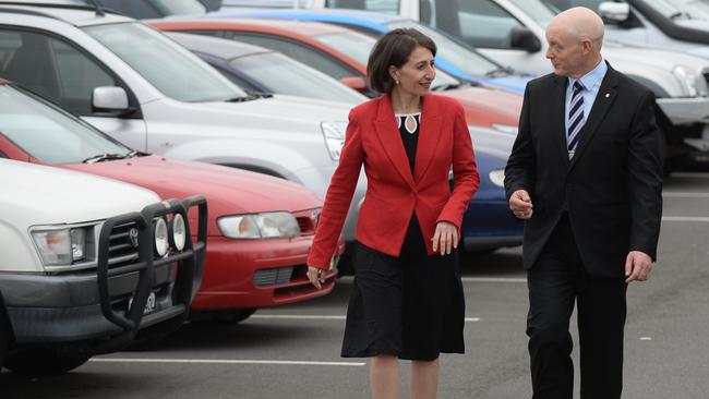 NSW premier Gladys Berejiklian and then Campbelltown MP Bryan Doyle promised to upgrade parking to Campbelltown Station in 2015. Picture: Robert Pozo