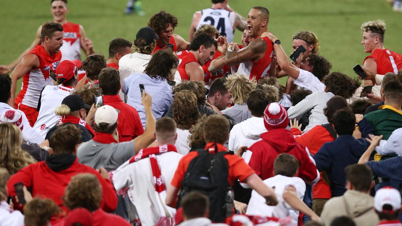 Lance Franklin of the Swans celebrates kicking his 1000th career goal. Picture: Jason McCawley