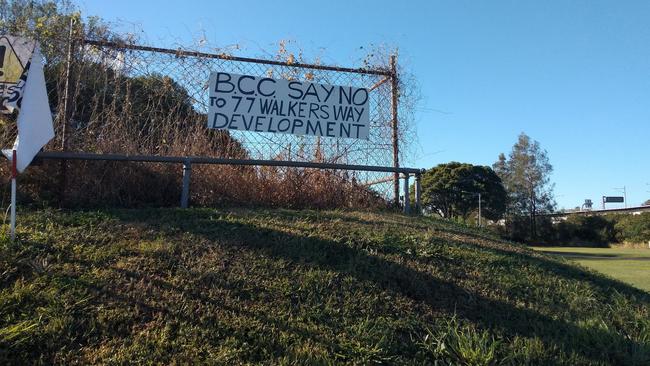 Nundah residents have put up signs protesting against a proposed townhouse development at 77 Walkers Way.