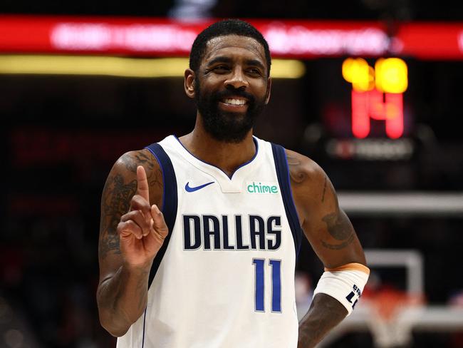 NEW ORLEANS, LOUISIANA - JANUARY 29: Kyrie Irving #11 of the Dallas Mavericks reacts during the game against the New Orleans Pelicans at Smoothie King Center on January 29, 2025 in New Orleans, Louisiana. NOTE TO USER: User expressly acknowledges and agrees that, by downloading and or using this photograph, User is consenting to the terms and conditions of the Getty Images License Agreement.   Chris Graythen/Getty Images/AFP (Photo by Chris Graythen / GETTY IMAGES NORTH AMERICA / Getty Images via AFP)