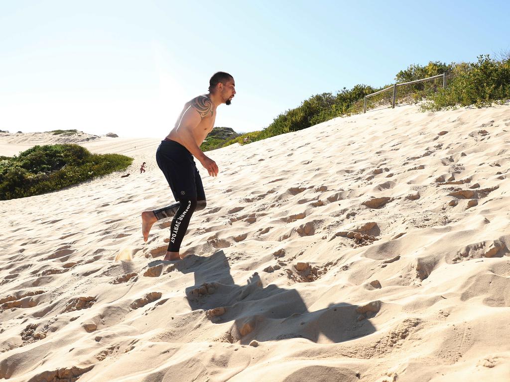 UFC fighter Rob Whittaker training at Wanda sand dunes, Cronulla. Picture: Brett Costello