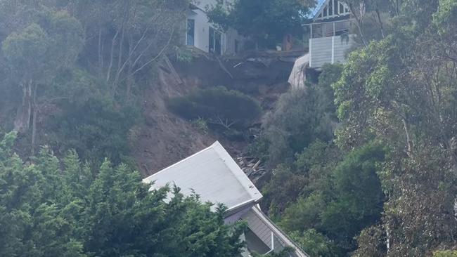 The house toppled and crashed to a property below. Picture: Facebook