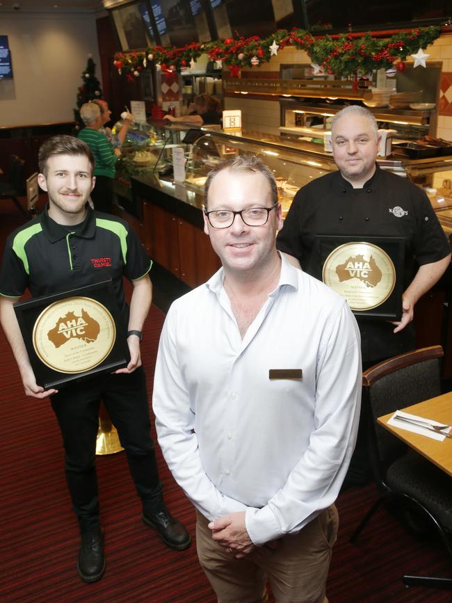 Kelly’s Motor Club Hotel in Cranbourne won the heart of the community award. Pictured are employee and scholarship recipient Jake Richards, owner Paul Stocks and award-winning head chef Damien Quinn — all Cranbourne locals. Picture: Norm Oorloff