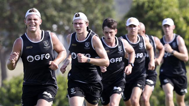 Dan Houston leads a Port Adelaide running group on the club’s training camp in Maroochydore. Picture: SARAH REED