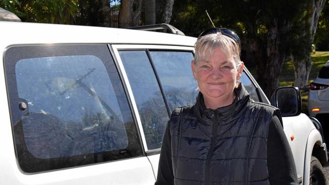 Kimberley Jones with her Pajero, where she had planned to live with her four kids if she did not find a house. Picture: Christian Berechree